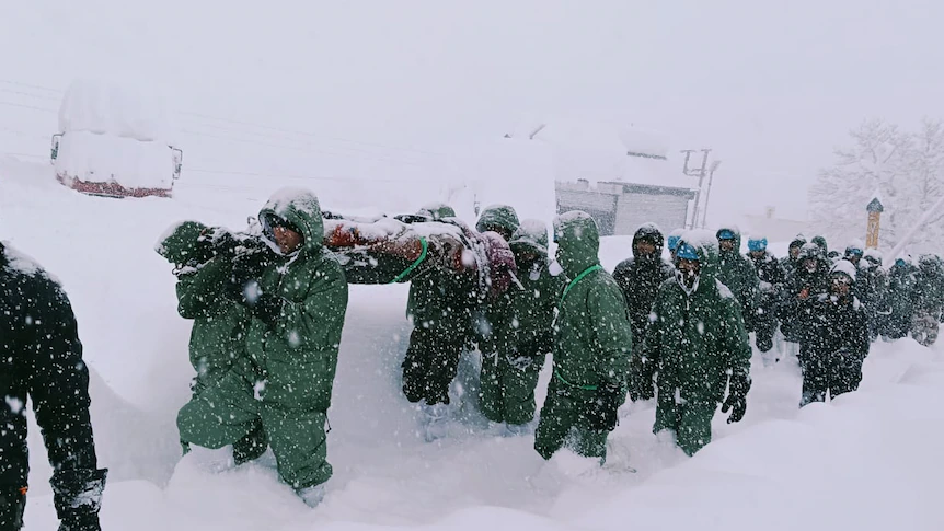 Rescuers searching for at least 25 people after avalanche in Indian mountain state