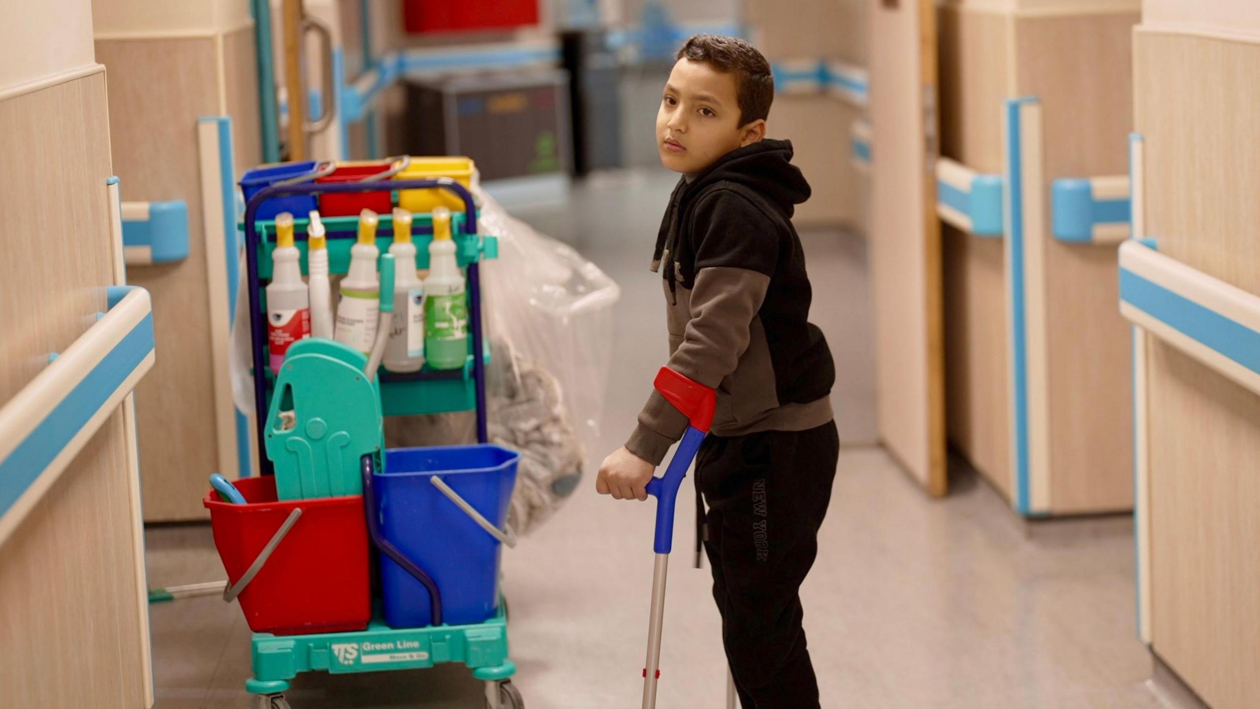 Gaza war: Injured Palestinian boy takes first steps in Jordan