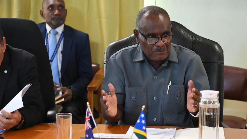 Solomons Islands PM takes aim at Trump's climate position, says 'differences' remain with Australia over policing