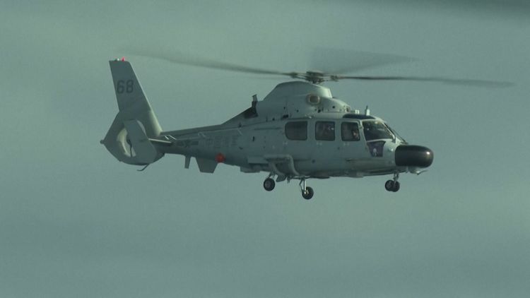 'Dangerous flying': Chinese navy helicopter came within three metres of patrol plane