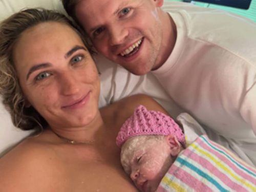 'Doing very well considering': Mum gives birth during ex-Tropical Cyclone Alfred