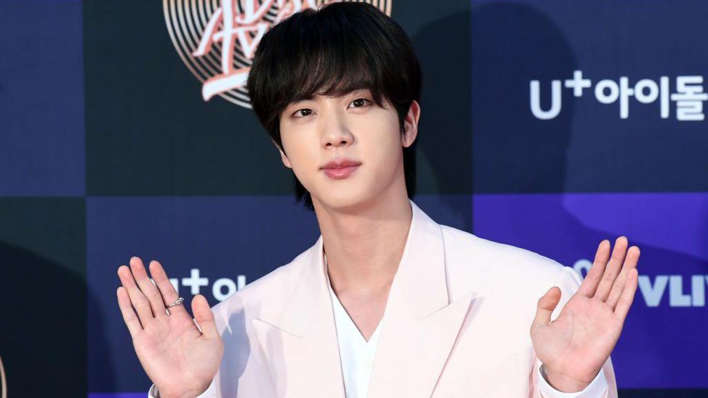 Japanese woman under investigation for kissing BTS's Jin