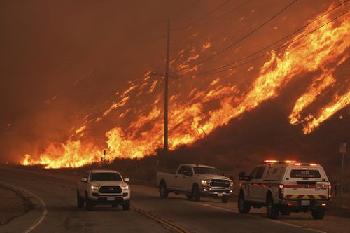 More than 50,000 under evacuation orders or warnings as wildfire imperils homes north of Los Angeles