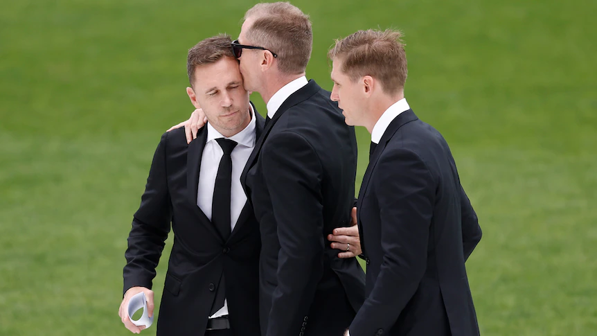 Troy Selwood farewelled in funeral at Kardinia Park by family, including brothers Joel, Adam and Scott