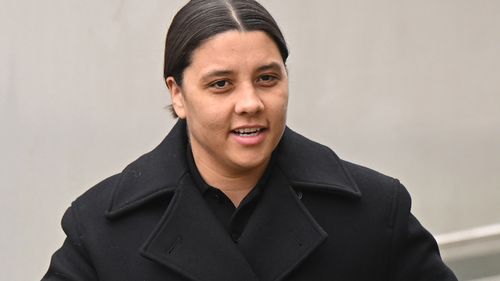 'Scared' Kerr 'trying to escape' from taxi before alleged racial abuse, court told