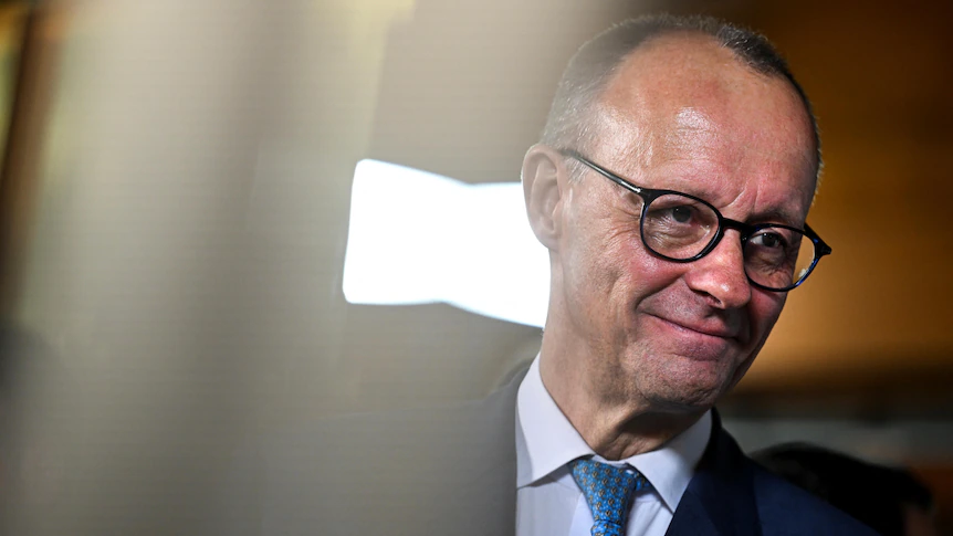 German conservative bloc claims election victory, with Friedrich Merz poised to be new chancellor