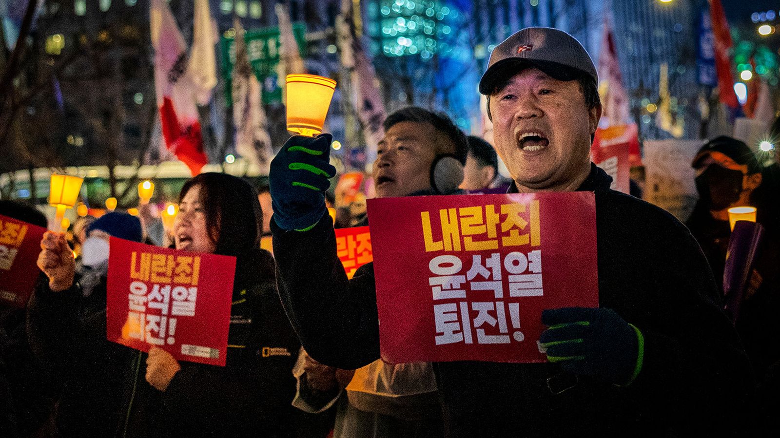 South Korean president apologises, saying he'll take responsibility for attempt at martial law