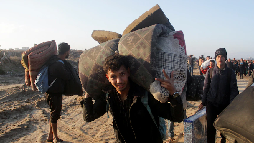 In pictures: Emotional scenes as Palestinians head home to northern Gaza amid ceasefire