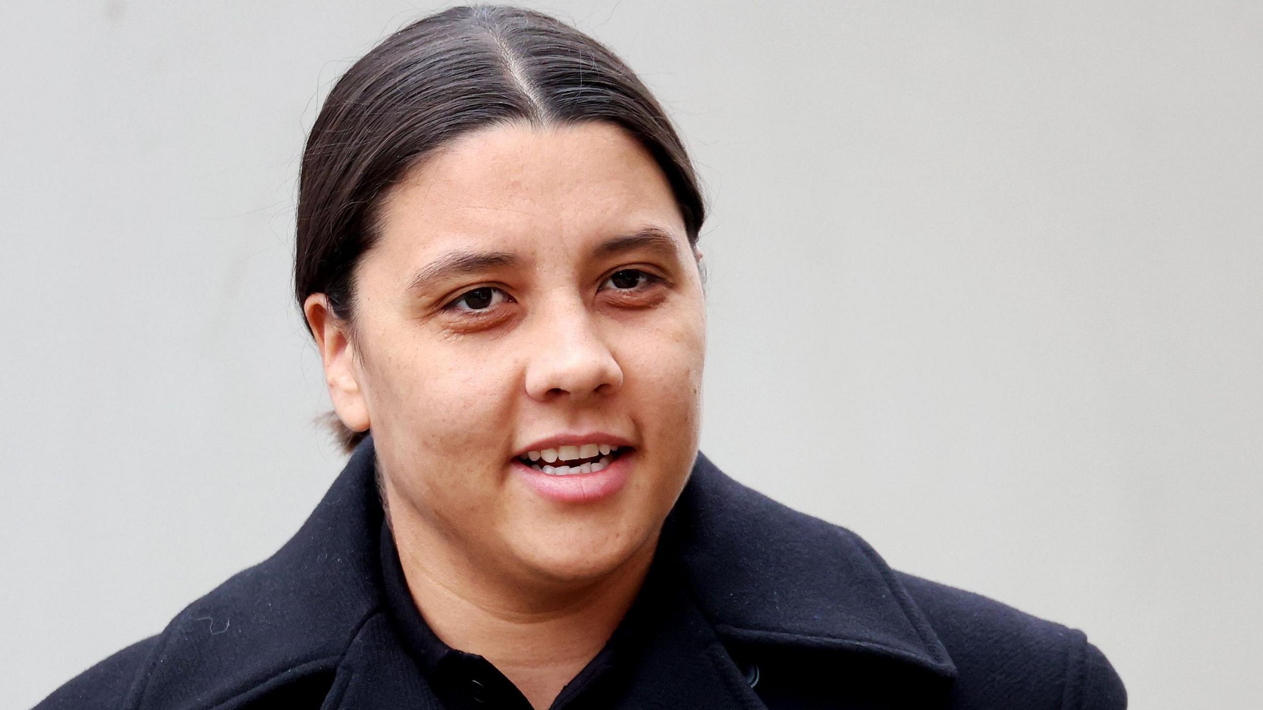 Footballer tells court police treated her differently